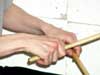 drumsticks in hand